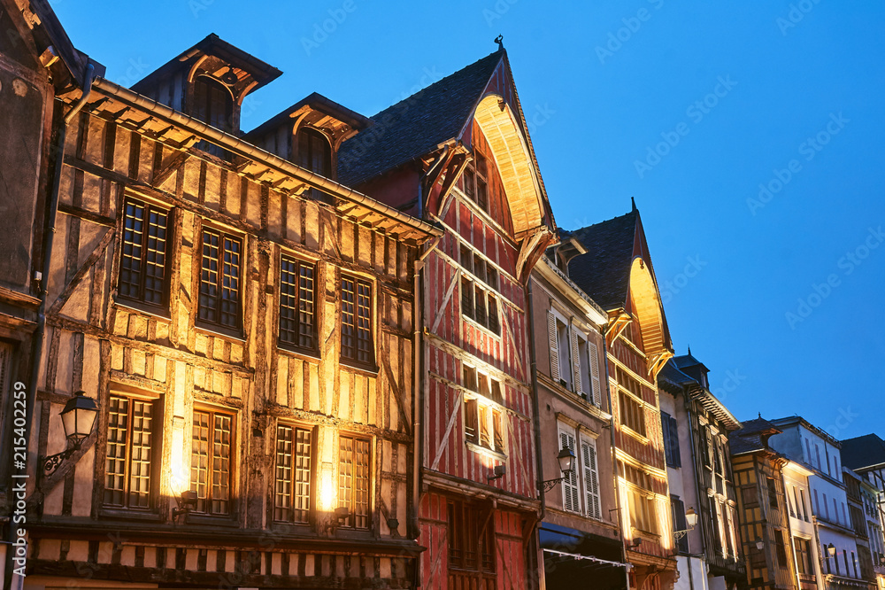 Fototapeta premium tenement houses in old town of Troyes at night, France.