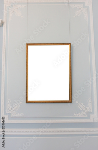 Empty Gold Border Frame with White Copy Space Isolated on Pale Blue Background. Blank Simple Template Design of Empty Golden Frame on Ornamental Museum Wall. Simple White Frame on Classic Background.