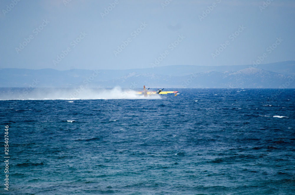 Athens Rafina Fire firefighter plane refilling water