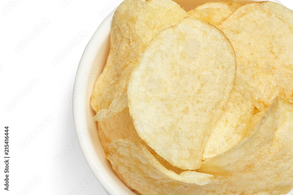Delicious golden potato chips in a white bowl isolated on white background close-up. Delicious golden potato chips in a white bowl isolated on white background close-up.