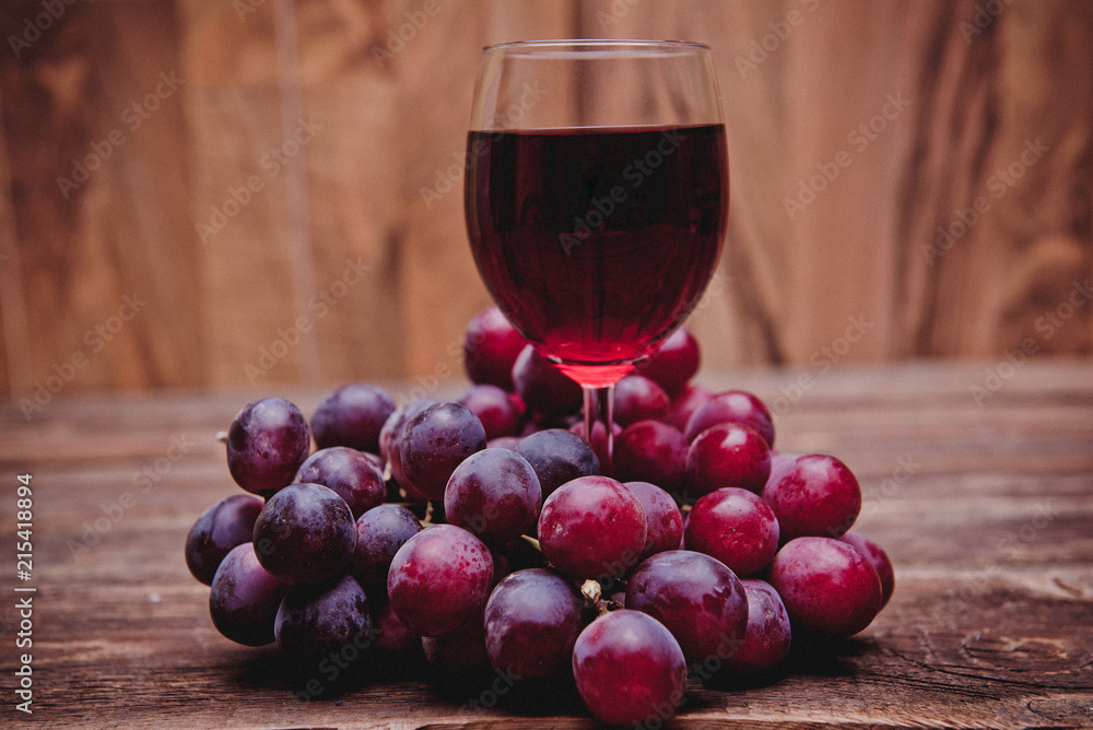 Glass filled with Red Grape Juice and fruits