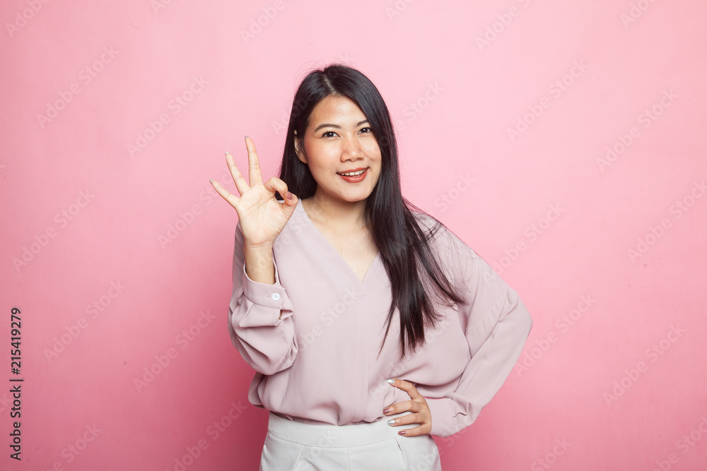 Young Asian woman show OK sign. Young Asian woman show OK sign.