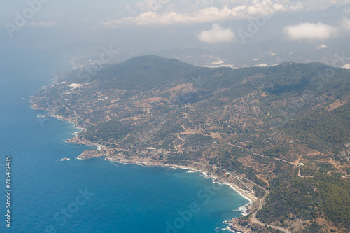 Fototapeta Naklejka Na Ścianę i Meble -  Beautiful view of the Mediterranean coast, in the Antalya region, Turkey from the height of the flying plane