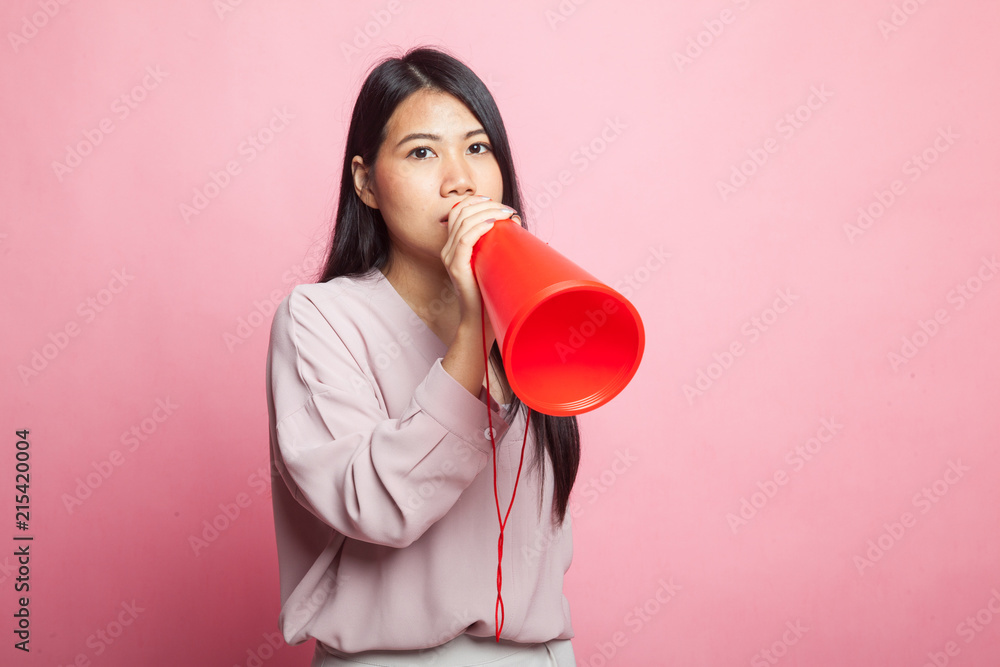 Beautiful young Asian woman announce with megaphone. Beautiful young Asian woman announce with megaphone.
