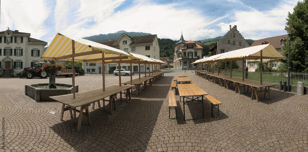 Fototapeta premium Flums market prior to arrival of goods, Swiss Alps