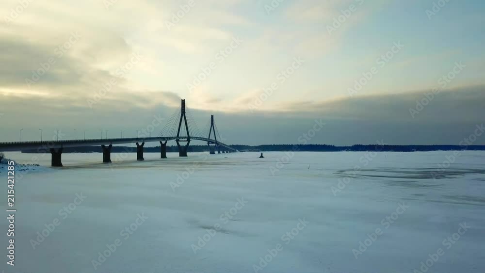 Aerial view of Finland's longest bridge located in the Kvarken archipelago. World heritage. Cold winter day. 4K footage.