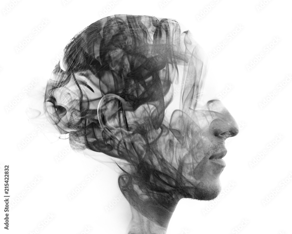 Double exposure portrait of a sexy statuesque man with dark features