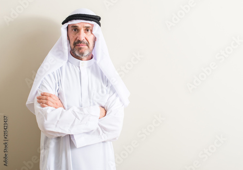 Senior arabic man with a confident expression on smart face thinking serious