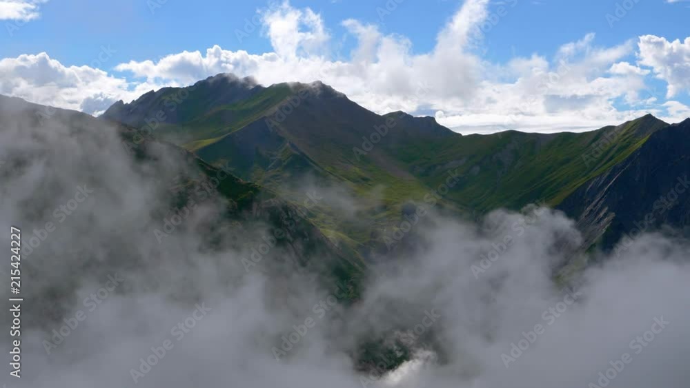 Time Lapse of low clouds moving in the mountains. Les Ménuires - France. Time Lapse of low clouds moving in the mountains. Les Ménuires - France.