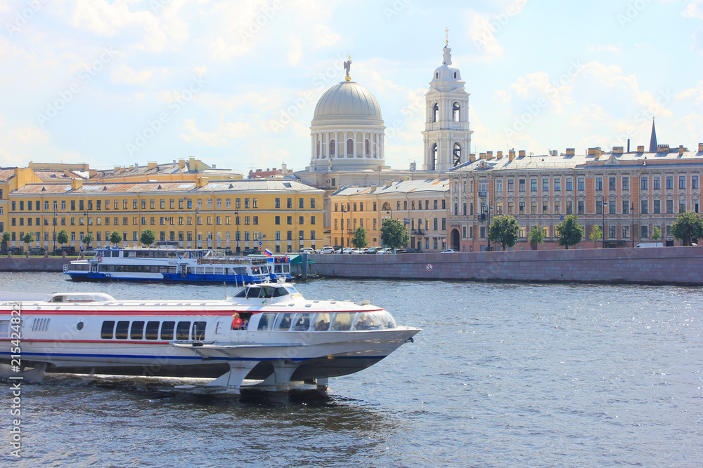 Saint Petersburg Panoramic Summer Cityscape with Historic Architecture Buildings in Russia. Outdoor Scenery of City Traditional European Style Houses and Tourist Cruise Boat on River at Summer Day