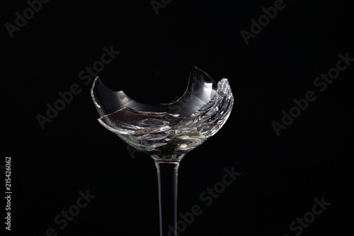 Broken glass in front of black background photographed under the name glass shards cocktail
