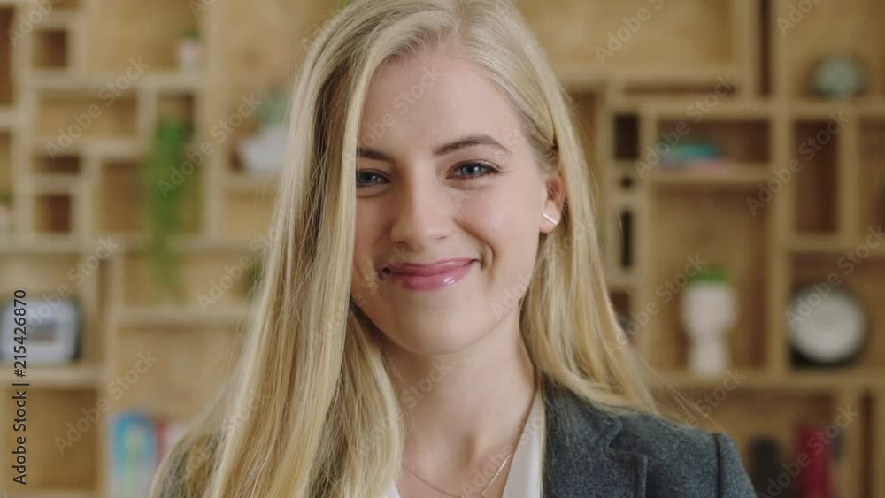 close up portrait of attractive young blonde business executive laughing confident successful independent woman close up portrait of attractive young blonde business executive laughing confident successful independent woman