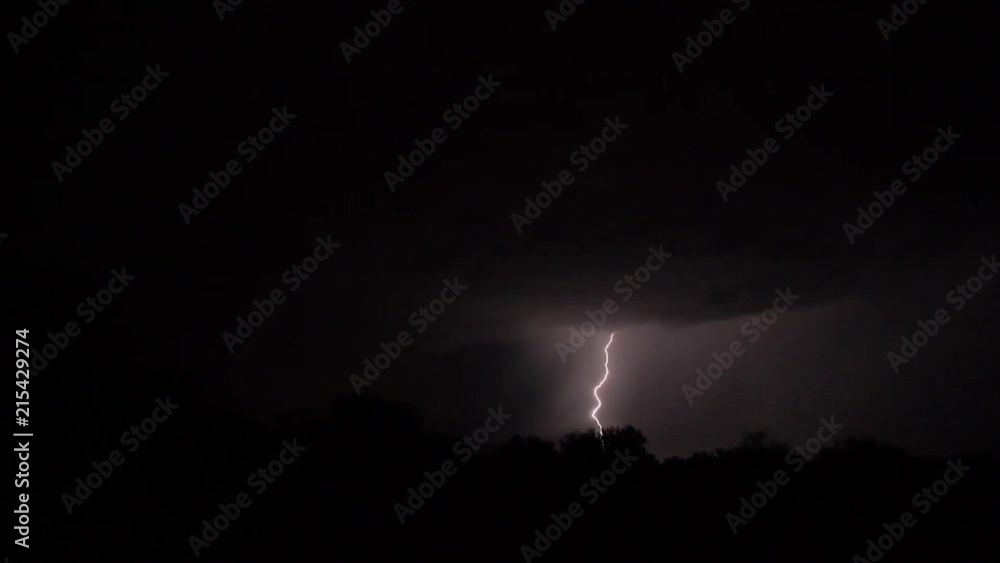 Bolts of lightning during a storm at night