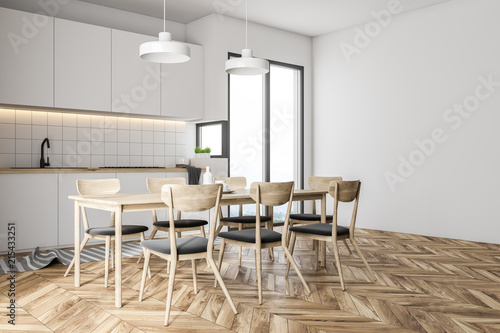 Gray chairs in a white kitchen interior