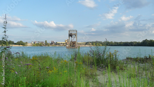 floating excavator and gravel plant photo