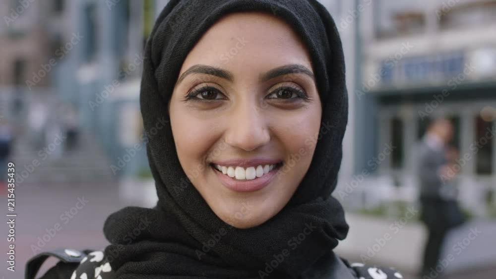 close up portrait of beautiful muslim woman smiling cheerfully wearing hijab headscarf close up portrait of beautiful muslim woman smiling cheerfully wearing hijab headscarf