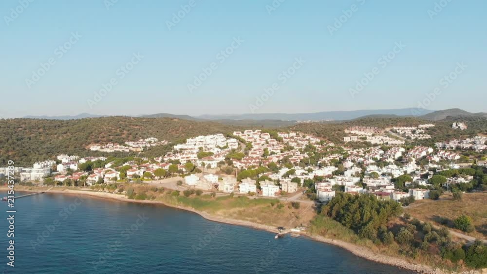 Drone shot of small coastal town and beach by the Aegean Sea (4K aerial) 2 Drone shot of small coastal town and beach by the Aegean Sea (4K aerial) 2
