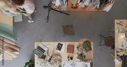 top view young fashion designer women sketching in startup company working designing stylish clothes drawing using tablet technology successful female entrepreneurs time lapse