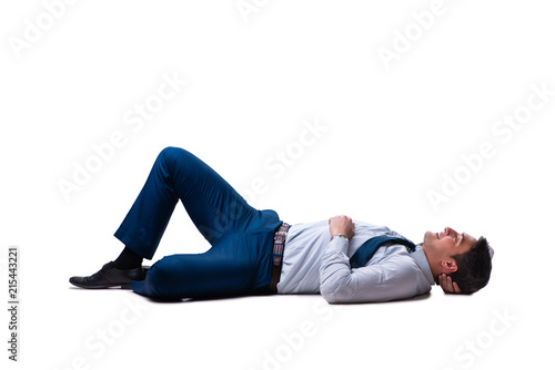 Businessman lying on the floor isolated on white photo