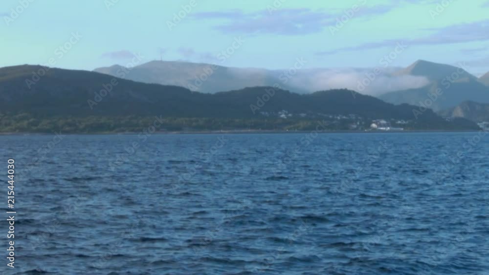 Fast timelapse of the atlantic ocean and some mountains in the background Fast timelapse of the atlantic ocean and some mountains in the background