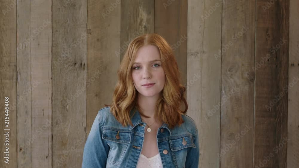 young stylish red head portrait of beautiful woman looking at camera pensive calm wearing denim jacket young stylish red head portrait of beautiful woman looking at camera pensive calm wearing denim jacket