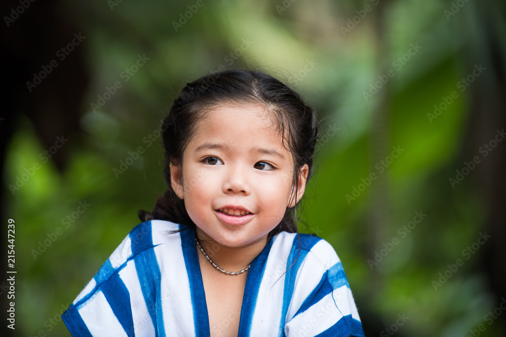 A cute asian girl portrait with sweet smile face A cute asian girl portrait with sweet smile face