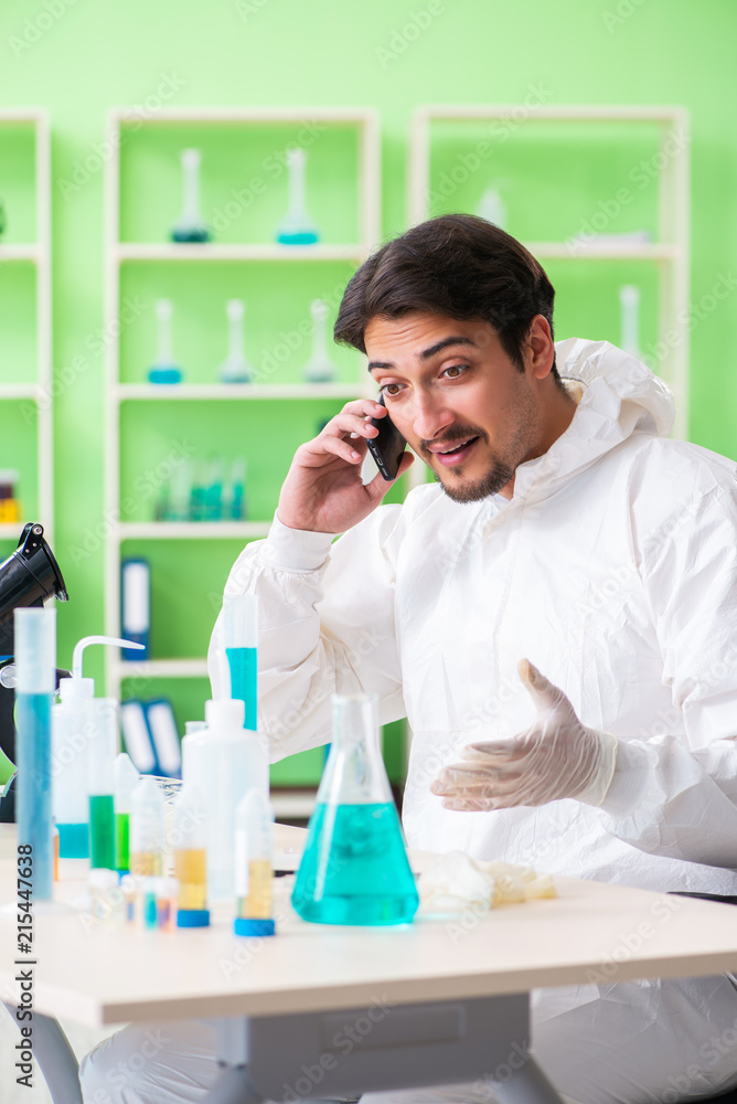 Chemist working in the lab on new experiment Chemist working in the lab on new experiment
