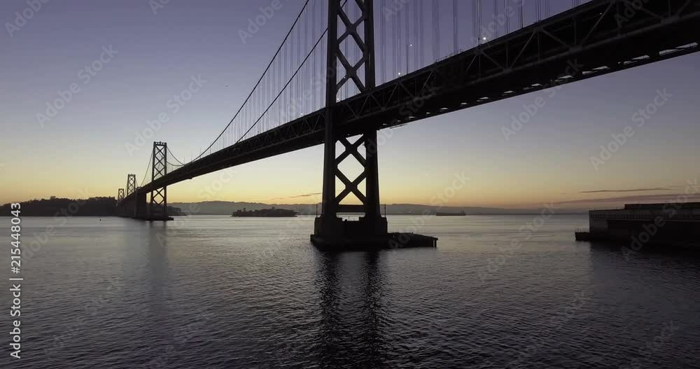 Sunrise view while flying over the San Francisco Bay Area towards the San Francisco and Oakland Bay bridge. Sunrise view while flying over the San Francisco Bay Area towards the San Francisco and Oakland Bay bridge.