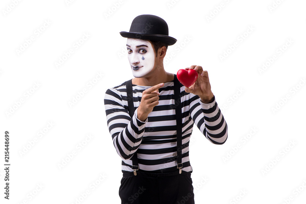 Mime holding red heart isolated on white background Mime holding red heart isolated on white background
