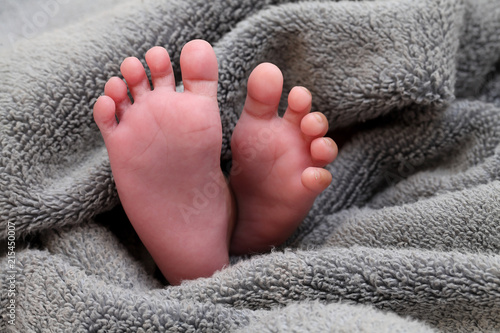 Close up of tiny foot of newborn baby 