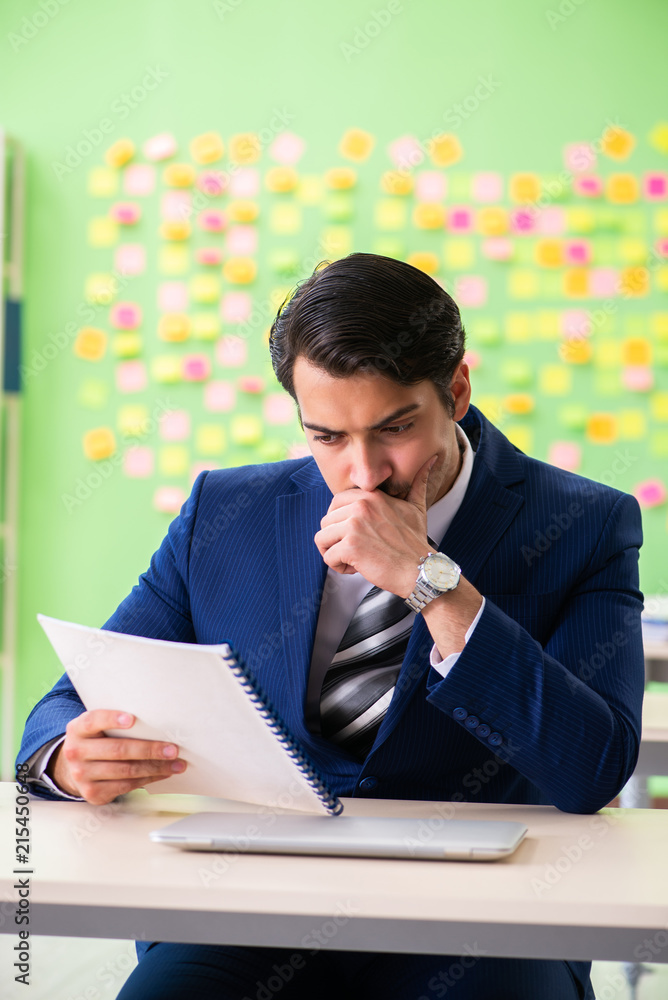 Businessman with many conflicting priorities Businessman with many conflicting priorities