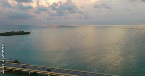 Some aerial footage of a bridge in the Florida Keys at sunset. photo