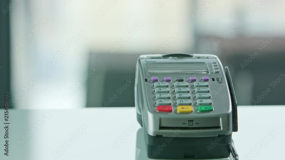 Mobile payment with a credit card, online shopping concept. Close-up shot Mobile payment with a credit card, online shopping concept. Close-up shot