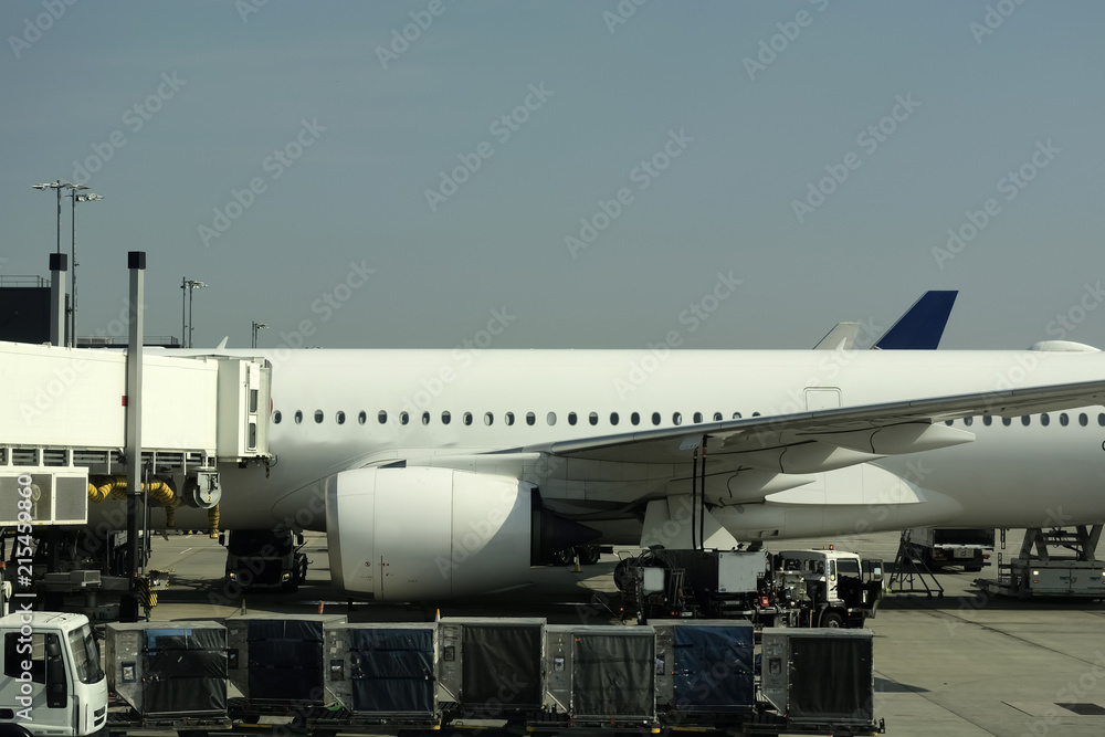 Close-up of large passenger aircraft on runway in airport. Close-up of large passenger aircraft on runway in airport.