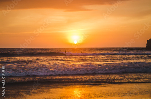 Warm sunset over the Pacific Ocean and beach of Montañita, Ecuador, a popular destination for surfers © Lozzy