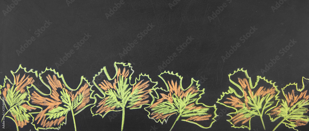 Obraz premium Banner Back to school. Drawing chalk on a blackboard Autumn leaves