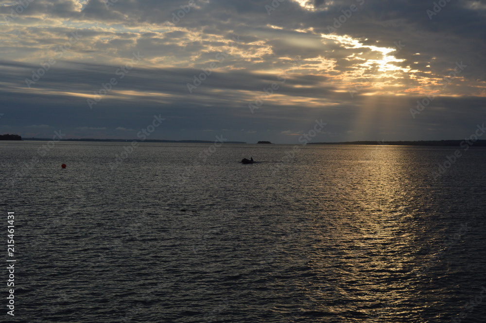 Obraz premium atardecer rio 