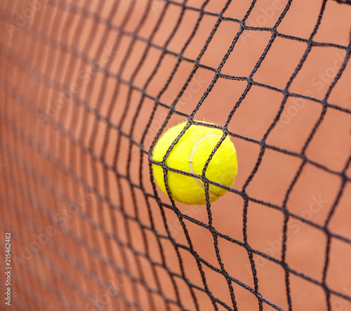 Tennis ball hitting to net © Grafvision