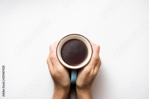 Tea in the palm on white background