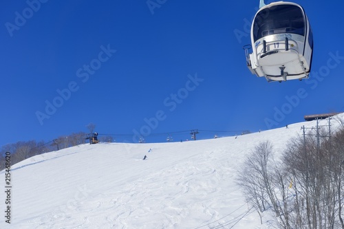 Panoramic ski at hakuba happo in Nagano Japan with blue and gondola photo