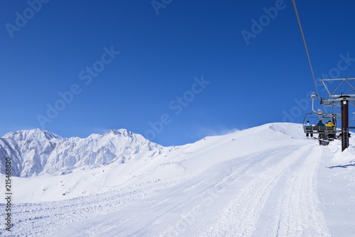 Panoramic ski at hakuba happo in Nagano Japan with blue and chairlift