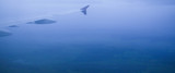 banner for website, View of jet plane wing with cloud patterns in the fog