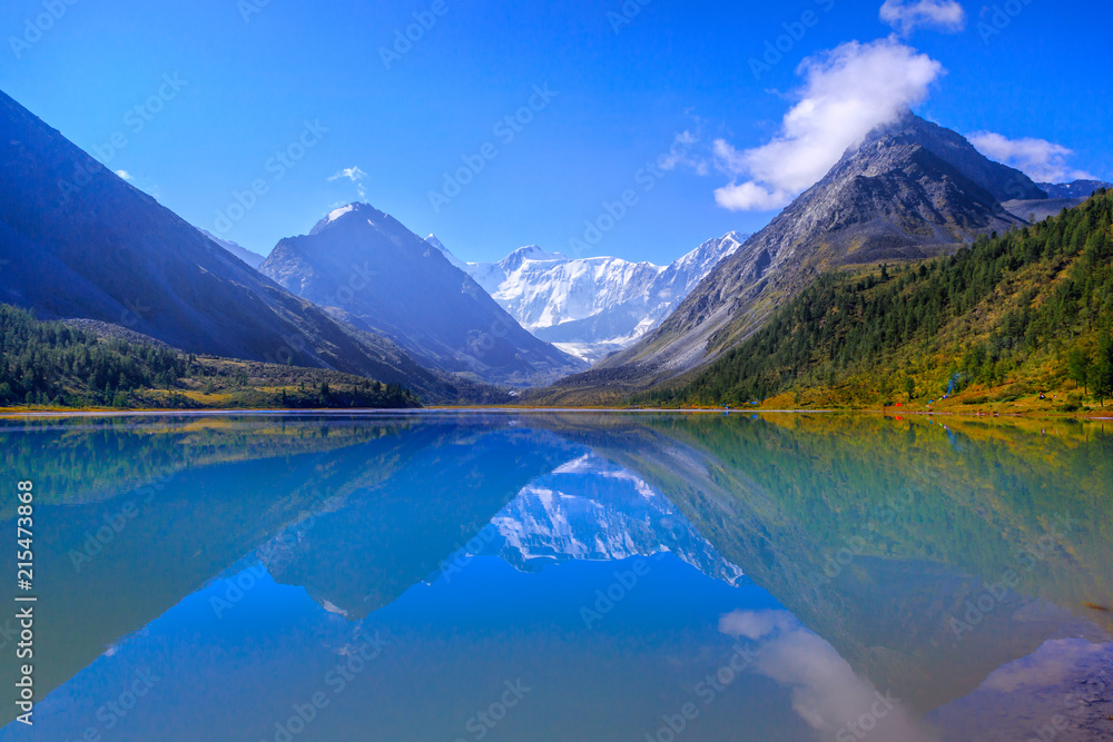 sacred sacred Belukha mountain reflected in the lake Akkem, Altai mountains, Russia