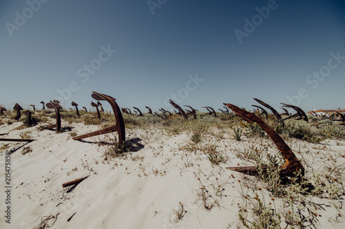 The old Anchor cemetery at the Barril beach in Tavira Algarve region Portugal photo