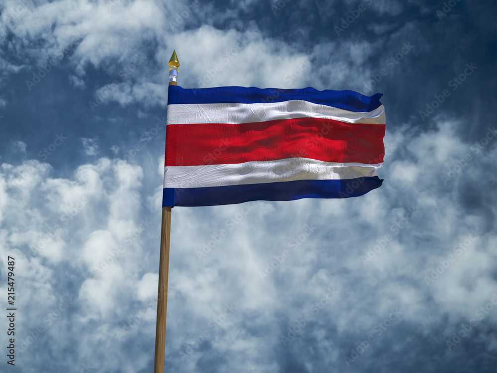 Costa Rica flag Silk waving flag of Costa Rica  transparent fabric with wooden flagpole gold spear on background sunny blue sky white smoke clouds real retro photo Countries of world 3d illustration