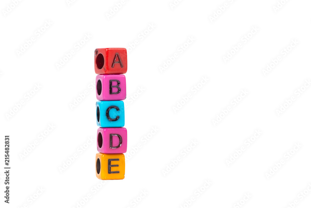 Pile of letter bead or beads with alphabet ABCDE on white background. Pile of letter bead or beads with alphabet ABCDE on white background.