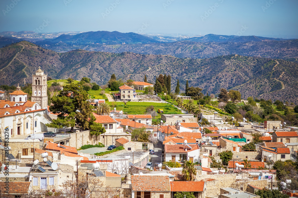 view of famous landmark tourist destination valley Pano Lefkara village, Larnaca, Cyprus. Ceramic tiled house roofs, greek orthodox church at south of Troodos hills, Kionia