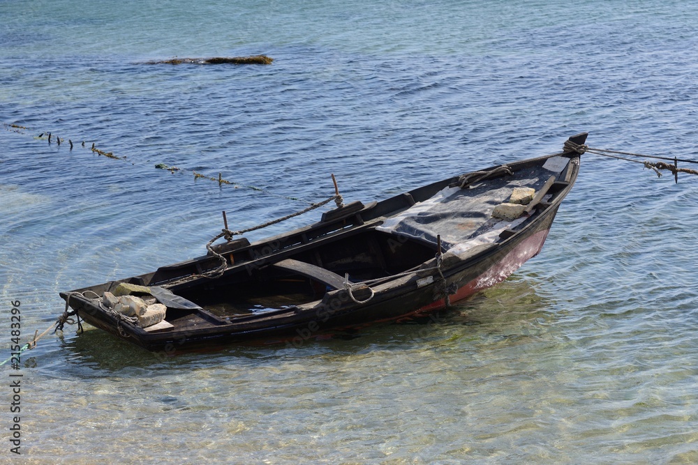 wooden fishing boat moored