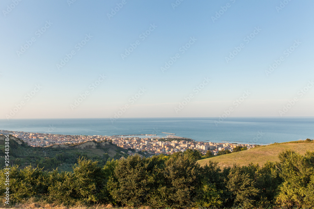Panoramic view of San Benedetto del Tronto city in the sunset light. Holiday city situated on the Adriatic sea coast, Italy