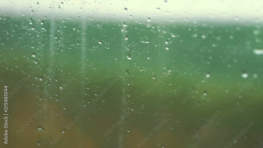 High quality video of driving car on the rainy day in 4k slow motion 60fps High quality video of driving car on the rainy day in 4k slow motion 60fps